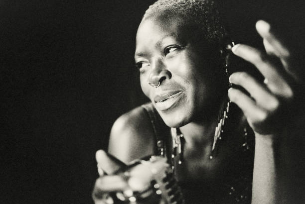 istock The female black pop musician. 1436807373