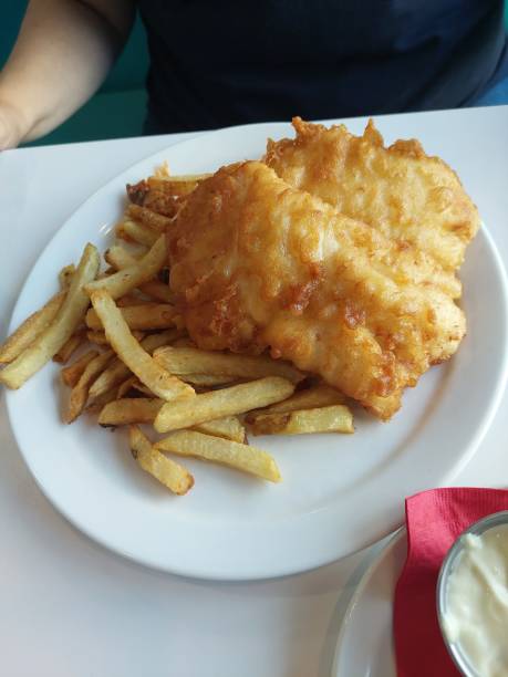 istock 2 pieces of fried fish and chips 1436810297