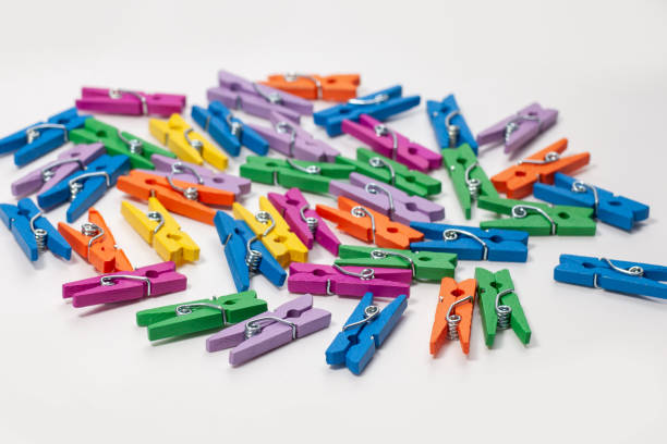 istock group of colorful clothespins isolated on white background 1436813404