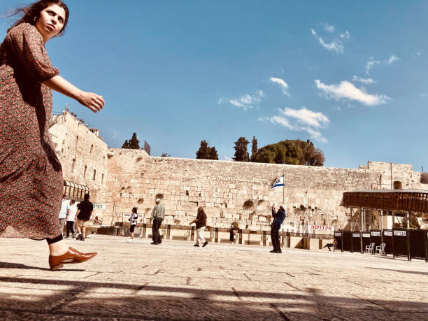 Also known as the Western Wall, the Kotel is a portion of the retaining wall left from the Second Temple, and the closest access available to the Temple Mount above. It is also a major tourist attraction, consistently crowded with visitors throughout the day.  The women's section is smaller and more crowded than the adjoining men's section.