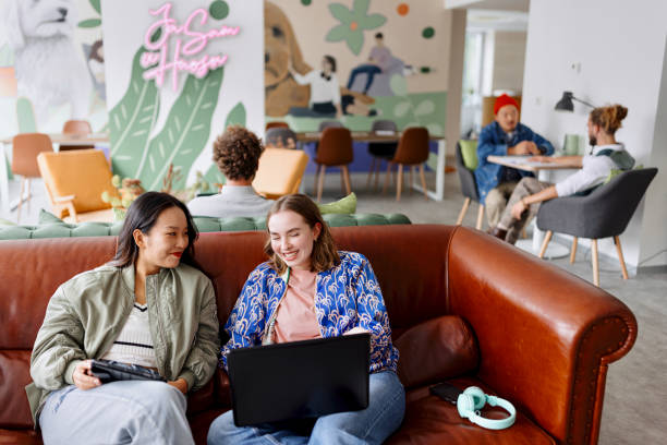 istock Two businesswomen working together in a modern office 1436821695