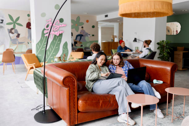 istock Two businesswomen working together in a modern office 1436821855