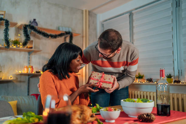 istock Boyfriend giving a present to his girlfriend 1436823287