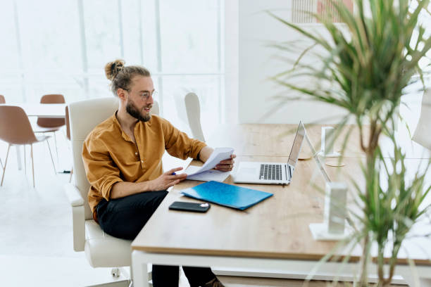 istock Business person working at a modern office 1436823334