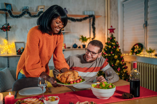 istock Woman setting up the table for dinner with her boyfriend 1436825314