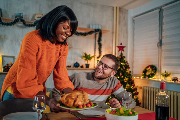 istock Woman setting up the table for dinner with her boyfriend 1436825405