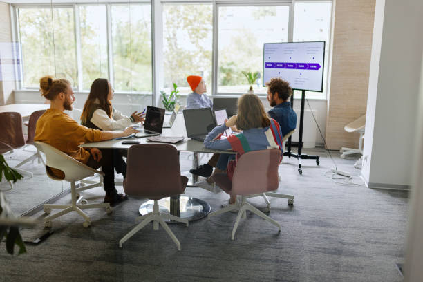 istock Group of business people work together in office 1436827186