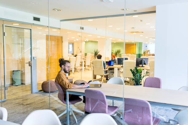 istock Young man on a meeting in a hybrid office 1436829790