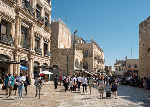 Jerusalem, Israel - Oct 11, 2022: The streets of Old City of Jerusalem are crowded with pilgrims and travellers during Sukkot Festival.