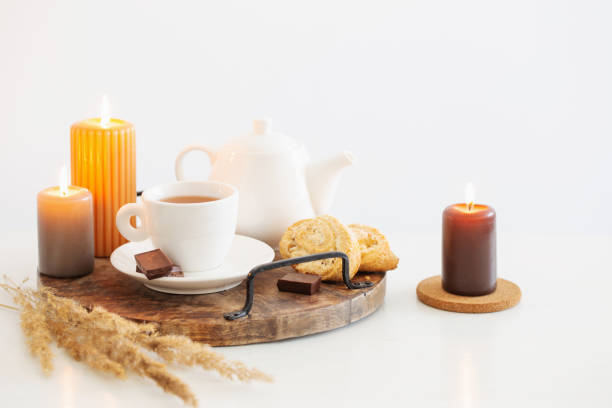 istock still life with burning candles in white modern interior 1436862798