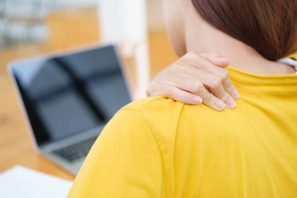 istock Young woman having back pain from office syndrome. 1436871430