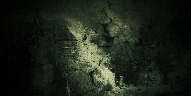 istock Cement texture full of scratches, scary dark concrete wall background 1436873455