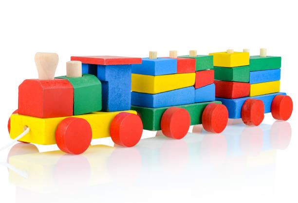 istock Wooden children's constructor-a steam train, isolated on a white background. Colorful toy train. Educational games for children. Design and modeling 1436881638