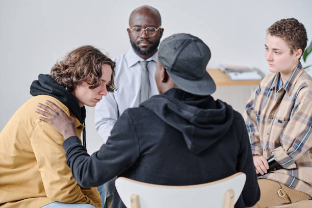 istock Teenage boy talking about problems to other people 1436883849