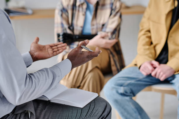 istock Psychotherapist talking to people 1436883923