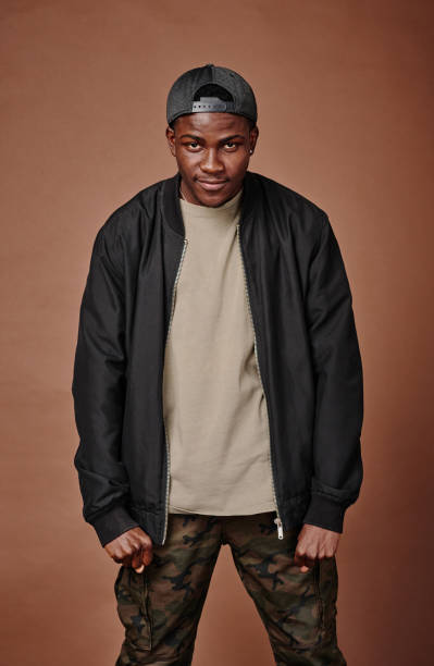 istock African teenage boy looking aggressive 1436884651