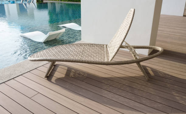 istock Outdoor leisure lying bed beside swim pool 1436892516