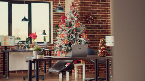 istock Empty company office with christmas tree and decor 1436899856