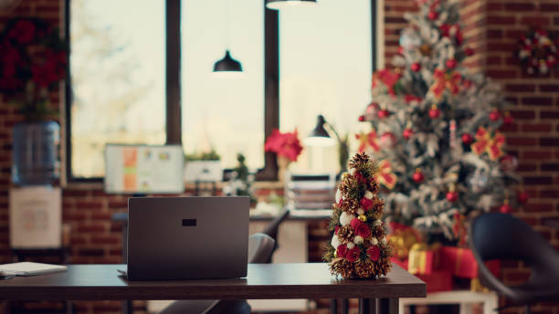 istock Empty startup office decorated with xmas ornaments 1436900003