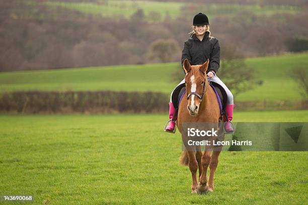 Teenage Girl Riding Horse In Field Stock Photo - Download Image Now - Horseback Riding, Horse, Riding