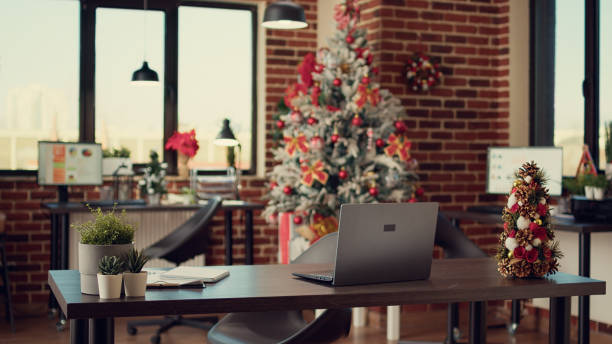 istock Empty company office with christmas lights decor 1436901007