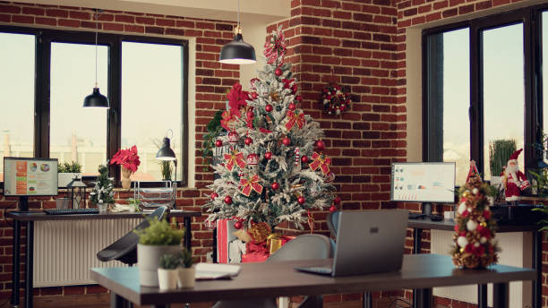 istock Christmas tree and decorations in company office 1436901022