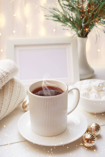 istock Winter, Christmas, New Year decorations composition, concept, background. White Mug, cup of tea, cookies. Christmas mood. Christmas greeting card. Mockup. 1436902328