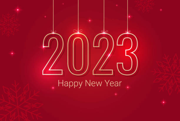 istock inscription 2023 Happy New Year on a red background with sparkles and snowflakes 1436905342