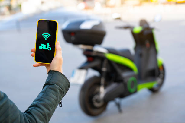 istock Connecting an electric motorcycle with the smartphone 1436908987