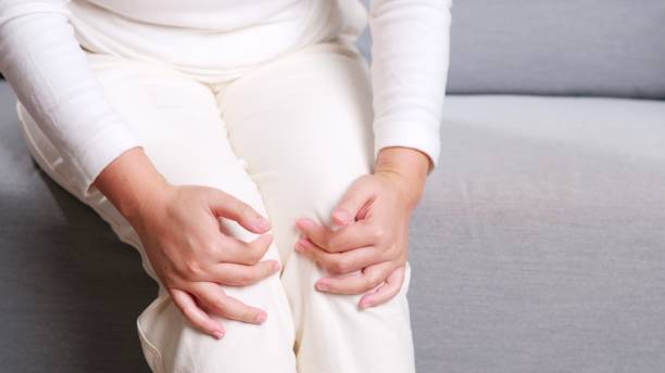 istock Self physiotherapy due to knee pain. 1436910949