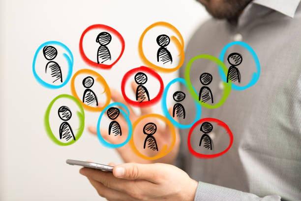 istock Team leader managing his team through a hologram interface 1436911016