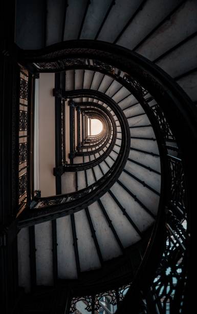 istock Vertical of a spiral staircase. 1436911556