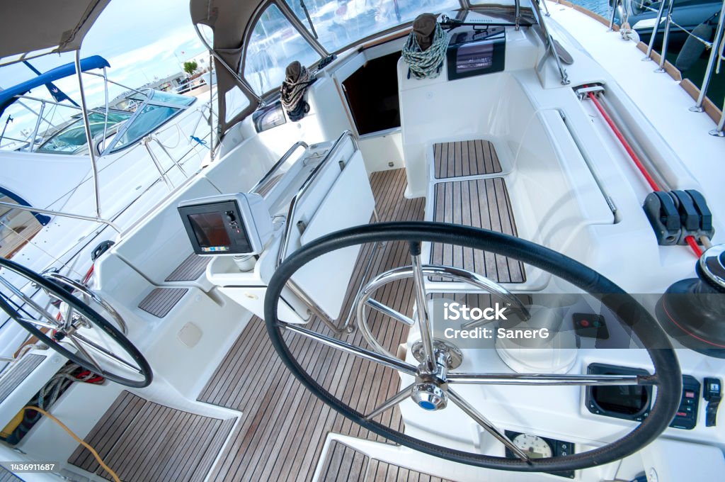 Double wheel sailboat stern deck area Boat Deck Stock Photo