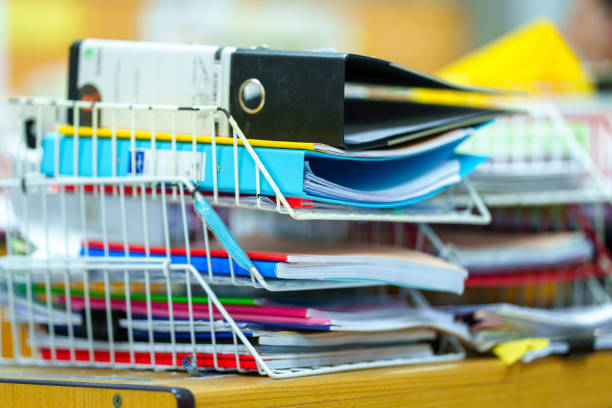istock extreamly close up the stacking of office working document with paper clip folder at office 1436911844