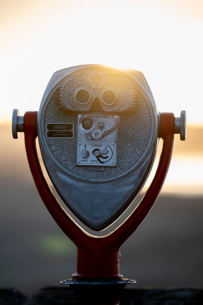 istock Vertical shot of binoculars outdoors at sunset 1436914308