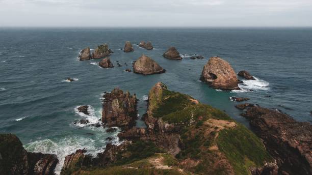 istock Down at Nugget Point from the viewing platform next to the lighthouse 1436914387