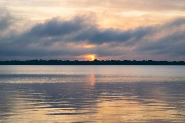 istock Beautiful sunrise over the Bacalar Lagoon, Mexico. 1436915123