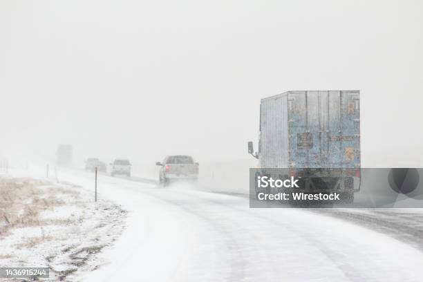 Winter Road Conditions With Vehicles On I80 In Southern Wyoming Near Vedauwoo And Buford Wy Stock Photo - Download Image Now