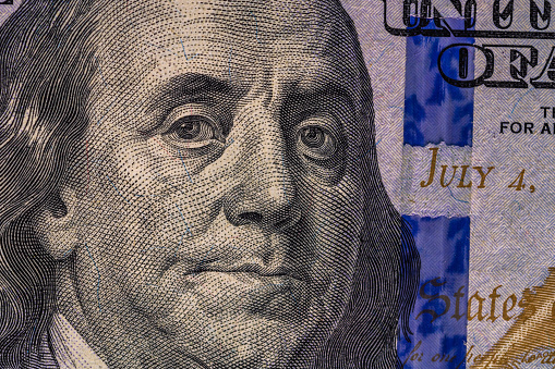 A closeup shot of a United States Dollar banknote - inflation and economy concept