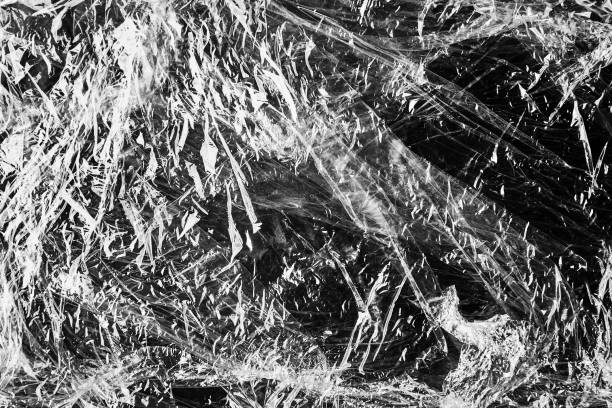 istock black cellophane bag close-up background texture of plastic 1436918426