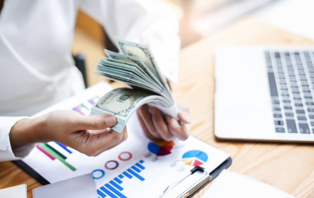 istock businesswoman working in office 1436918962
