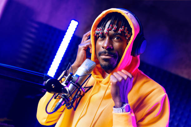 istock Young African performer recording his new track in recording studio 1436919272