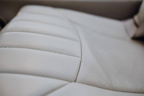 istock Interior of a car with white leather seats 1436921639