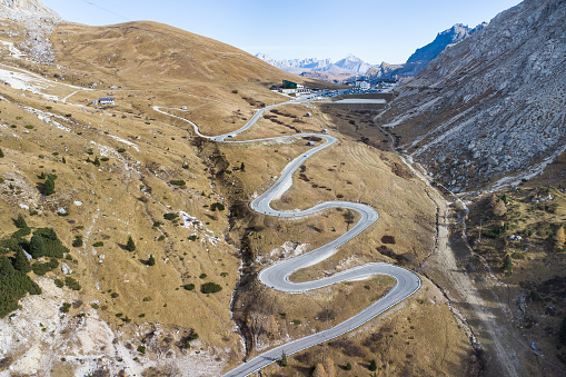 The scenic mountain pass road Passo Pordoi in the italian Dolomites near Cortina d'Ampezzo