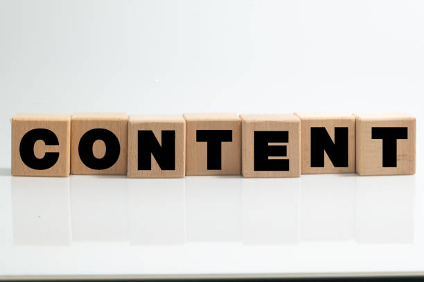 Wooden cubes block which print screen content wording on the table. Creative business marketing concept.