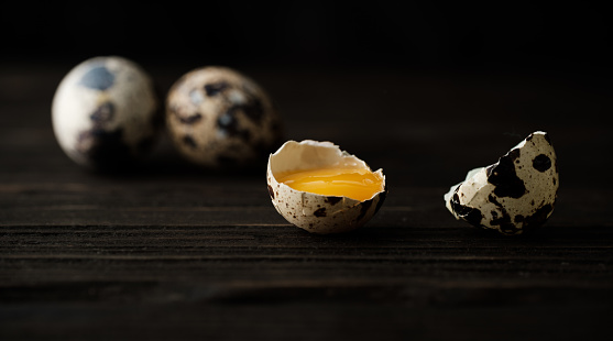 quail eggs on old wood background