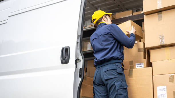 istock Delivery woman adjusting packages 1436929110