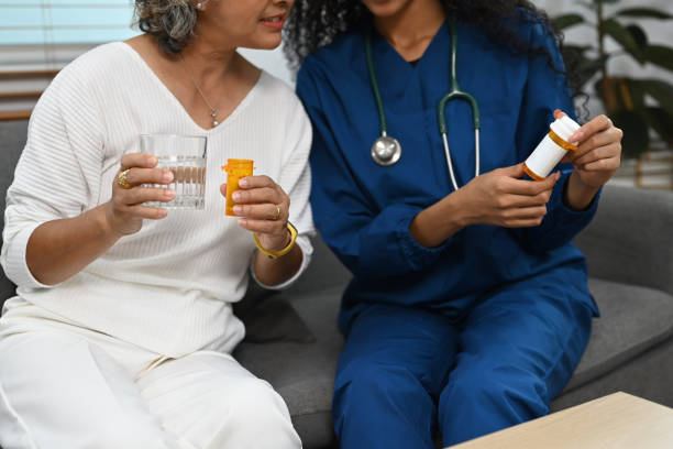 istock Cropped image of practitioner nurse explaining medicine dosage to senior patient. Elderly healthcare concept. 1436929189