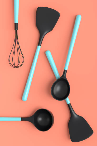 istock Wooden kitchen utensils, tools and equipment on coral background. 1436934168
