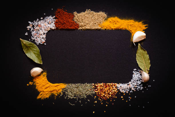 istock Various spices on black background top view with copy space 1436935781
